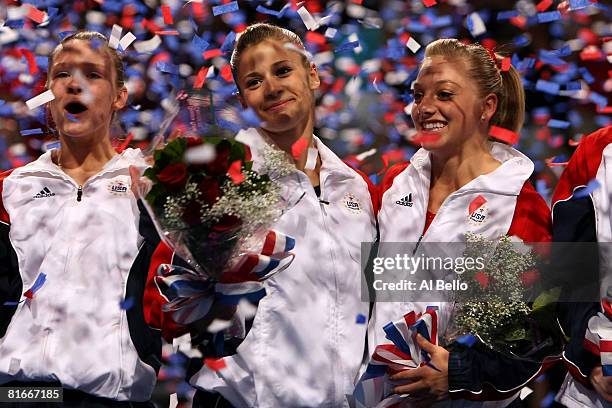 Bridget Sloan, Alicia Sacramone and Samantha Peszek look on after competing during day four of the 2008 U.S. Olympic Team Trials for gymnastics at...