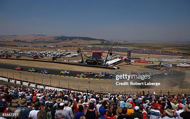 Kasey Kahne driver of the Budweiser Dodge leads the field at the start of the NASCAR Sprint Cup Series Toyota/Save Mart 350 at the Infineon Raceway...