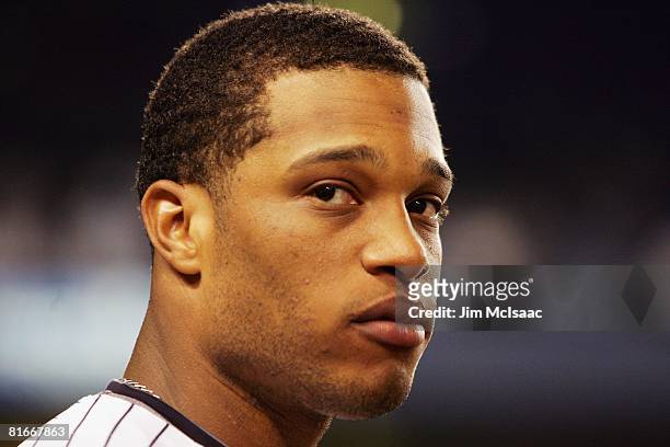Robinson Cano of the New York Yankees looks on against the San Diego Padres at Yankee Stadium June 18, 2008 in the Bronx borough of New York City....
