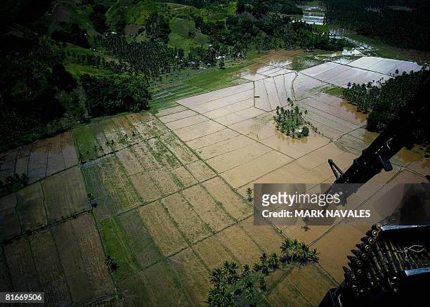 This photograph shows a view from a Philippine Air Force helicopter as it conducted a search and rescue operation on June 22, 2008 in Cotabato City...