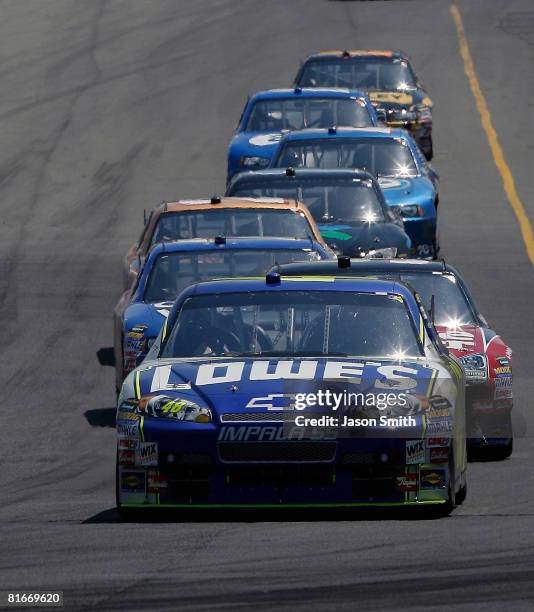 Jimmie Johnson, driver of the Lowe's Chevrolet, leaqds a pack of cars, during the NASCAR Sprint Cup Series Toyota/Save Mart 350 at the Infineon...