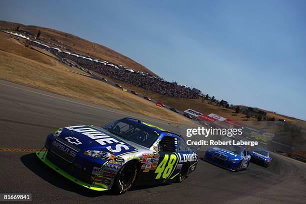 Jimmie Johnson driver of the Lowe's Chevrolet leads a pack of cars during the NASCAR Sprint Cup Series Toyota/Save Mart 350 at the Infineon Raceway...