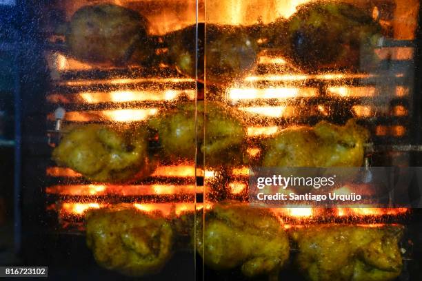 close-up of chickens being roasted - rotisserie stock pictures, royalty-free photos & images