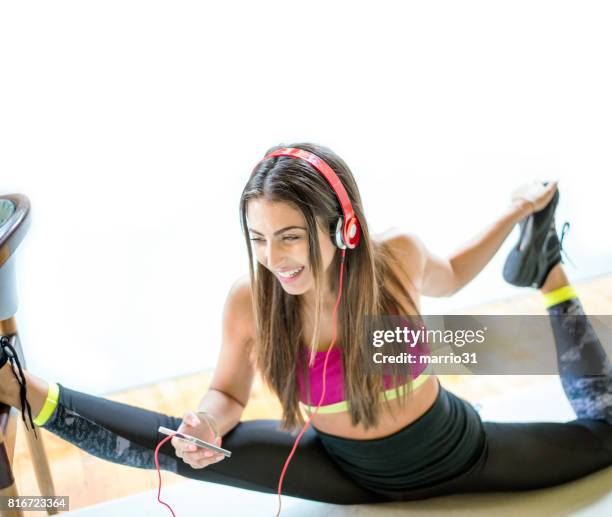 female gymnast in a gym - girl yoga stock pictures, royalty-free photos & images