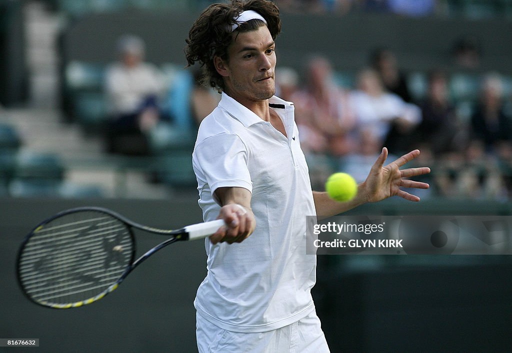 Canada's Frank Dancevic plays against Da