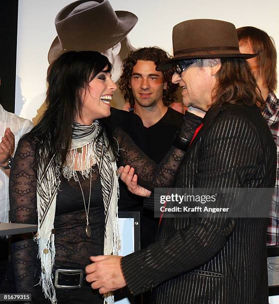 Singer Stefanie Kloss from the band Silbermond and Singer Udo Lindenberg pose during the Platin and Triple-Gold Award at the 'Bank' on June 23, 2008...