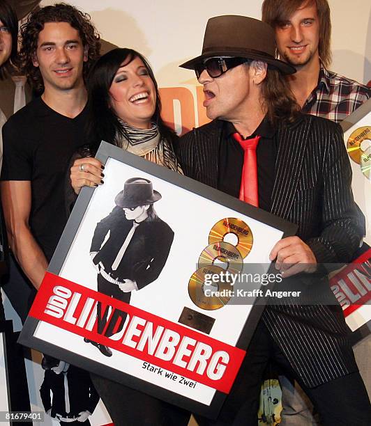Singer Stefanie Kloss from the band Silbermond and Singer Udo Lindenberg pose during the Platin and Triple-Gold Award at the 'Bank' on June 23, 2008...