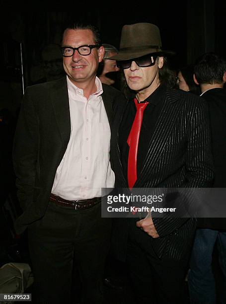 Editor in chief of German paper 'Bild-Zeitung' Kai Diekmann and Singer Udo Lindenberg pose during the Platin and Triple-Gold Award at the 'Bank' on...