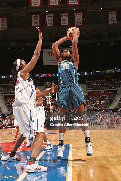 Charde Houston of the Minnesota Lynx takes a jump shot against Kara Braxton of the Detroit Shock during the game on June 20, 2008 at the Palace of...