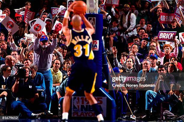 Reggie Miller of the Indiana Pacers shoots a free-throw in Game One of the Eastern Conference Semifinals against the New York Knicks during the 1995...