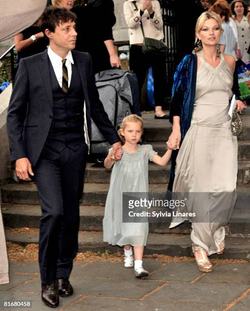 Jamie Hince, Kate Moss and her daughter attend Leah Wood and Jack Macdonald's wedding at Southwark Cathedral on June 21, 2008 in London, England.