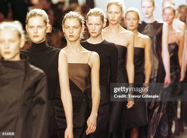 Models on the runway at the finale of the Calvin Klein Fall/Winter 1999 Fashion Show in New York City, February 19, 1999.