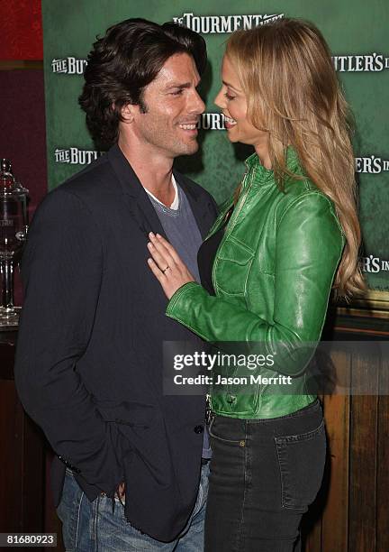 Greg Lauren and Elizabeth Berkley arrive at the Los Angeles premiere of the short film "The Butler in Love" in Hollywood, California on June 23, 2008.