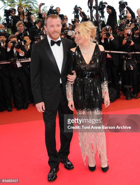 Director Guy Richie and singer Madonna attend the "I Am Because We Are" premiere at the Palais des Festivals during the 61st International Cannes...