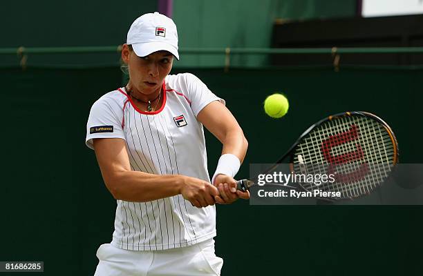 Marina Erakovic of New Zealand plays a backhand during the women's singles round one match against Michaella Krajicek of Netherlands on day two of...