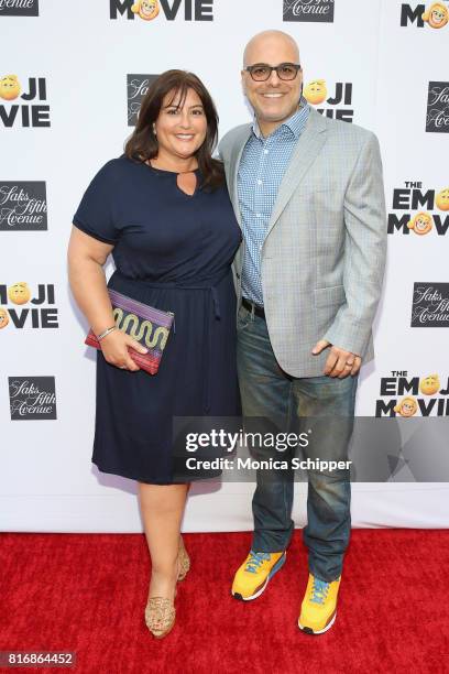 Producer Michelle Kouyate and director Tony Leondis attend the Saks Fifth Avenue and Sony Picture Animation's celebration of "The Emoji Movie" at...