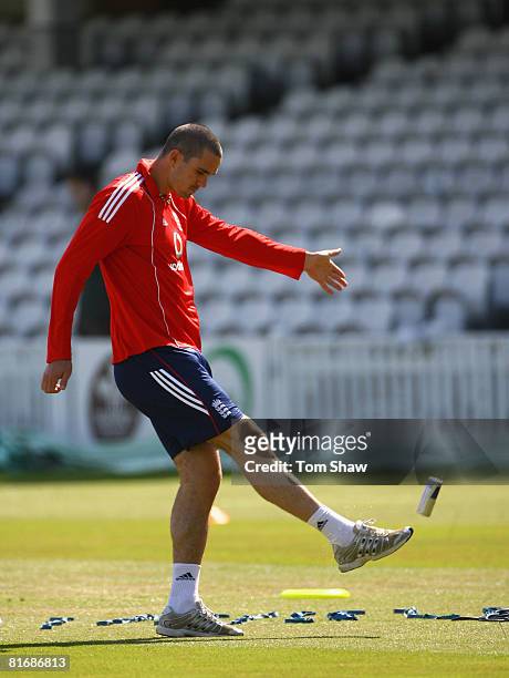 Kevin Pietersen of England kicks a can during the England and New Zealand nets at the Oval on June 24, 2008 in London, England.