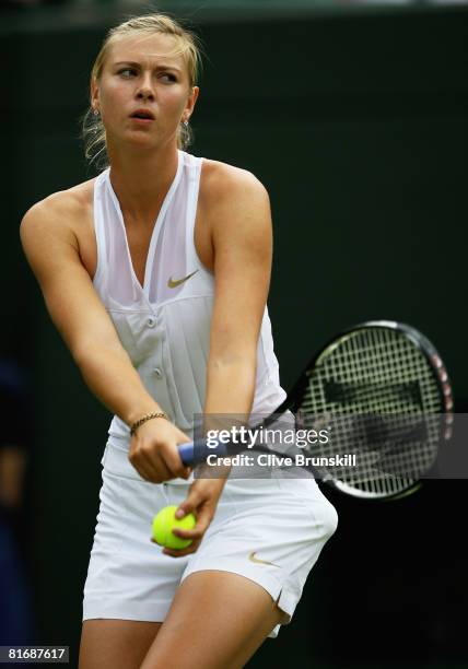 Maria Sharapova of Russian Federation serves during the women's singles round one match against Stephanie Foretz of France on day two of the...