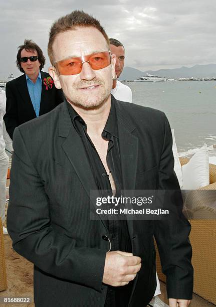 Musician Bono attends the Petra Nemcova & The Creative Coalition Celebrate the Creation of LOVE at the Nikki Beach during the 61st Cannes...