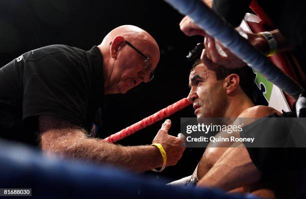 Johnny Lewis speaks to Jeff Fenech during his welterweight fight against Azumah Nelson at the Vodafone Arena on June 24, 2008 in Melbourne, Australia.