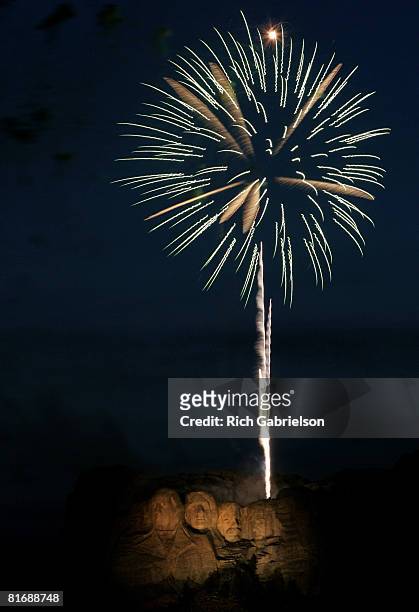 Fireworks light up the sky over Mount Rushmore at Keystone, South Dakota on July 3, 2005.