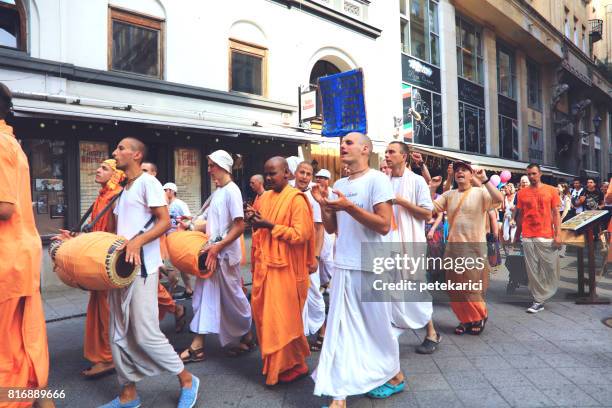 hare krishna movement members on budapest street - international society for krishna consciousness stock pictures, royalty-free photos & images