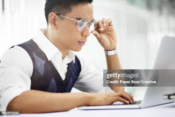 3,176 Filipino Using Computer Stock Photos, High-Res Pictures, and ...
