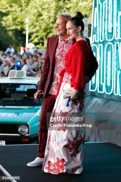 Uwe Fahrenkrog-Petersen and his partner Christin Dechant attend the 'Atomic Blonde' world premiere at Stage Theater on July 17, 2017 in Berlin,...