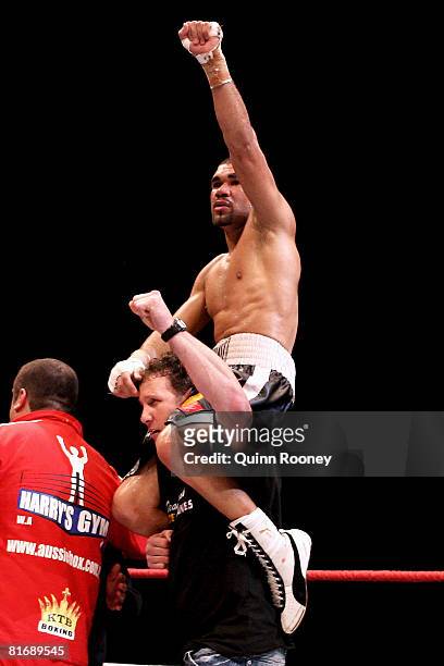 William Kickett celebrates winning his fight against Gairy St Clair before the Jeff Fenech and Azumah Nelson welterweight fight at the Vodafone Arena...