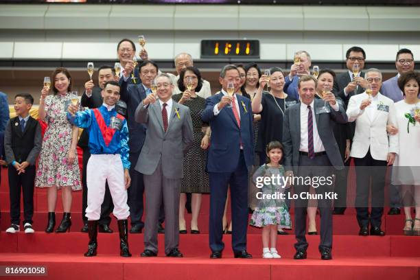 All 2016/17 Champion Awards winners celebrate with a champagne toast and group photo at the 2016/17 Champion Awards presentation ceremony on July 16,...