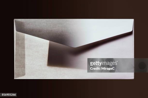 privacy in illuminated envelope - phone tapping stockfoto's en -beelden