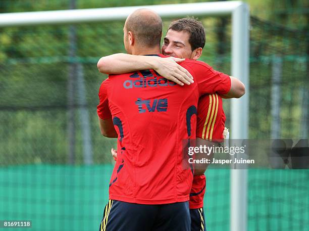 Goalkeeper Iker Casillas of Spain embraces Pepe Reina during a training session at the Kampl training ground on June 24, 2008 in Neustift Im...