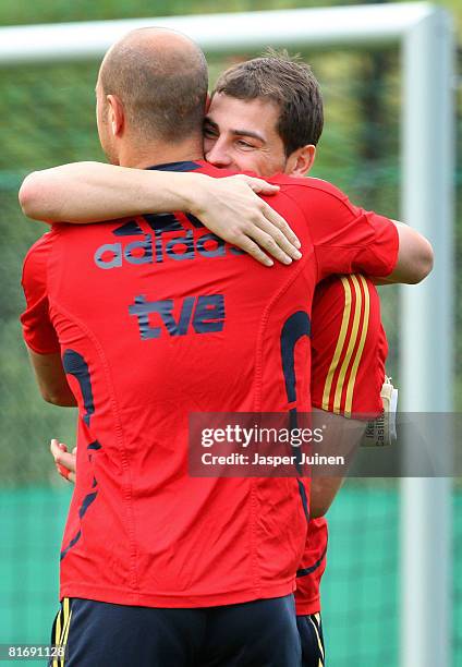Goalkeeper Iker Casillas of Spain embraces Pepe Reina during a training session at the Kampl training ground on June 24, 2008 in Neustift Im...