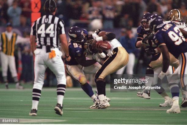 Defensive tackle John Randle of the Minnesota Vikings sacks quaterback Aaron Brooks of the New Orleans Saints in the 2000 NFC Divisional Playoff Game...