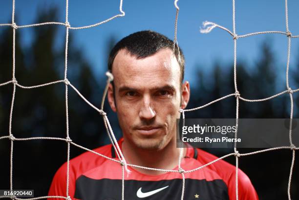 Mark Bridge poses during a portrait session Blacktown International Sportspark on July 18, 2017 after signing with the Western Sydney Wanderers in...