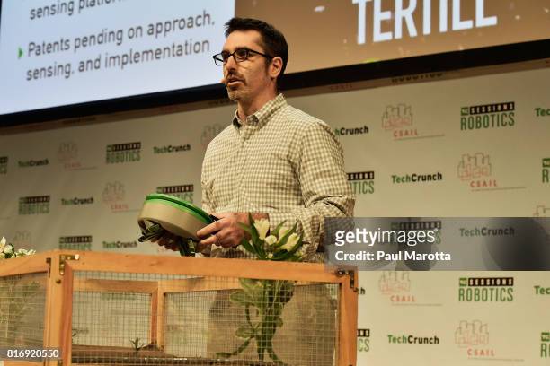 Rory MacKean competes at a Pitch-Off Session that includes judges Jeremy Conrad, Helen Greiner, Daniel Theobold and Melonee Wise at the TechCrunch...