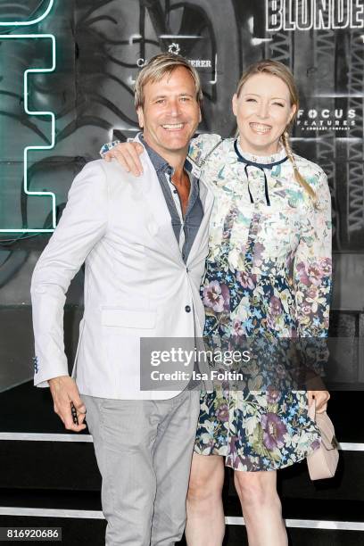 British singer Steve Norman and his wife Sabrina Winter attend the 'Atomic Blonde' World Premiere at Stage Theater on July 17, 2017 in Berlin,...