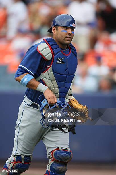 Gerald Laird of the Texas Rangers catches during the game against the New York Mets at Shea Stadium in Flushing, New York on June 15, 2008. The...