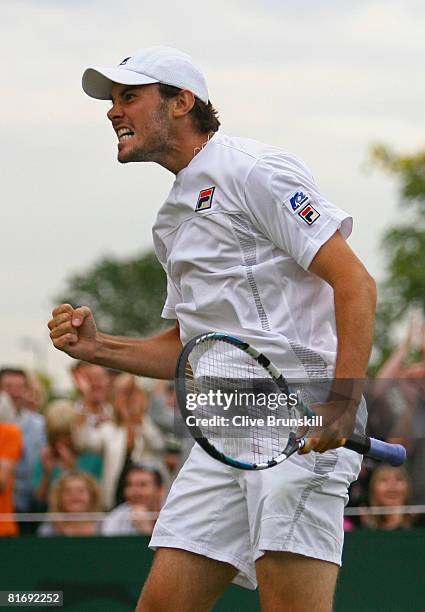 Chris Eaton of United Kingdom celebrates a point during the men's singles round one match against Boris Pashanski of Serbia on day two of the...