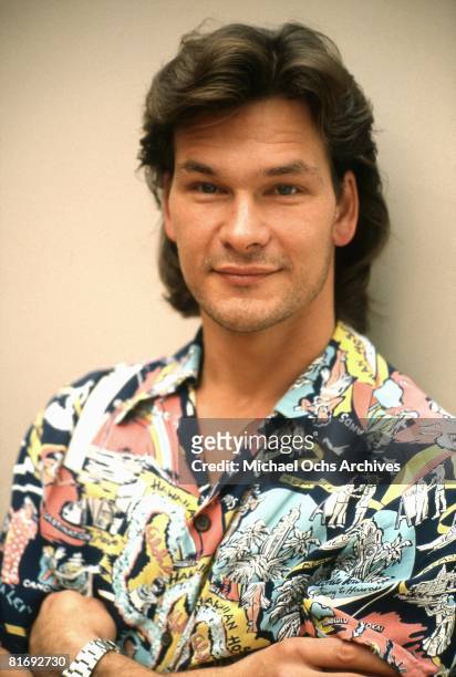 Actor and dancer Patrick Swayze poses for a portrait at home in 1987 in Los Angeles, California.