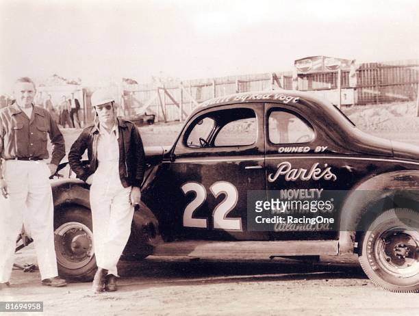 Red Byron stands with his mechanic Red Vogt. They won the 1948 NASCAR Modified championship in the organization's first year of operation.