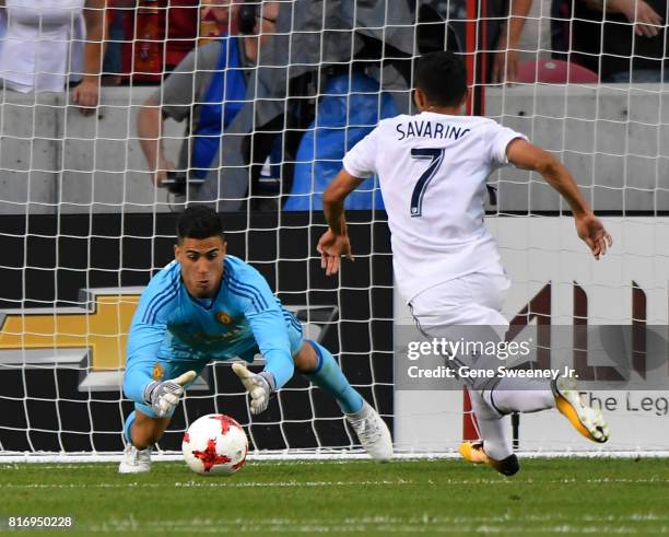 Goalie Joel Castro Pereira of Manchester United makes this first half save on a shot by Jefferson Savaring of Real Salt Lake during the International...