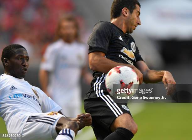 Demar Phillips of Real Salt Lake kicks the ball past Henrikh Mkhitaryan of Manchester United during the first half of the International friendly game...