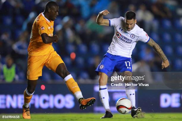 Edgar Mendez of Cruz Azul struggles for the ball with Bruno Martins Indi of Porto during a match between Cruz Azul and Porto as part of Super Copa...