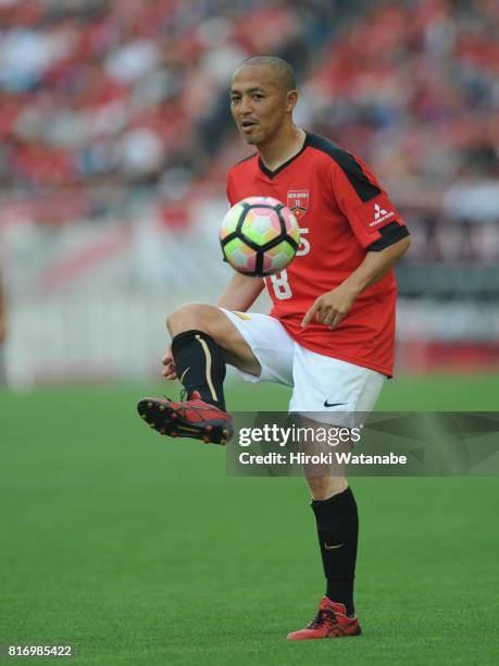 Shinji Ono of Reds Legends in action during the Keita Suzuki testimonial match between Reds Legends and Blue Friends at Saitama Stadium on July 17,...