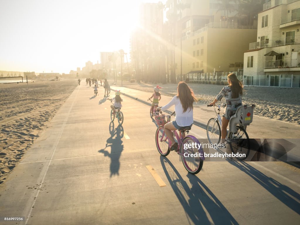 Mothers and daughters ride bikes in Long Beach, CA