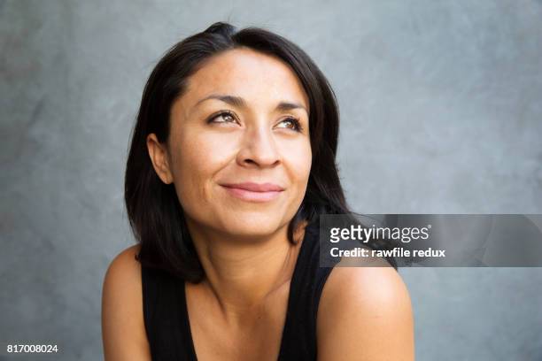 An optimistic looking young woman