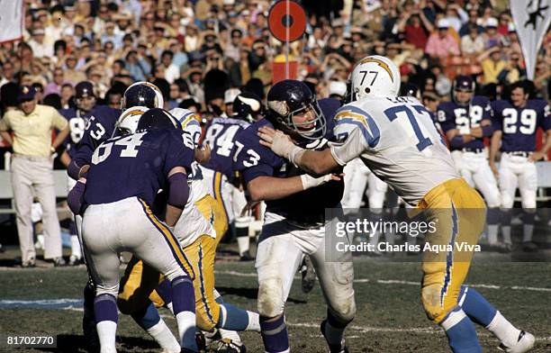 Hall of Fame tackle Ron Yary of the Minnesota Vikings provides pass protection against defensive tackle Ron East of the San Diego Chargers during a...