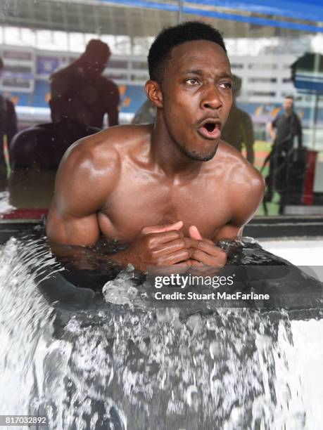 Danny Welbeck of Arsenal takes an ice bath after a training session in Shanghai on July 18, 2017 in China.