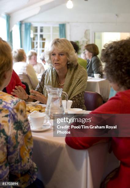 Camilla, Duchess of Cornwall, a member of the WI, meets members of the Myddfai Women's Institute at the village hall in Myddfai, near Llandovery on...